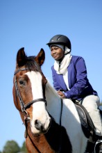 Atleta de equitación  musulmanade una nación africana
