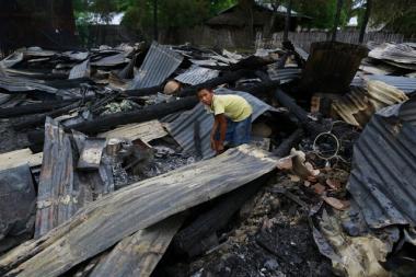 Destruction of homes of Muslims by extremist Buddhists in Myanmar.