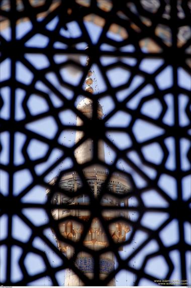 External View of a Minaret at Imam Reza&#039;s Holy Shrine in Mashhad - Iran